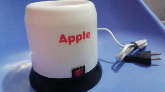 The Apple Baby Bottle Feeder Warmer is designed to safely and quickly warm all types of baby bottles. Perfect for busy parents, it ensures your baby's milk is always at the right temperature.